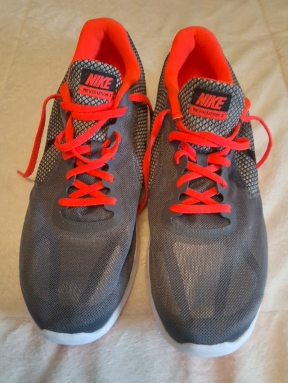 Nike Gray Sneakers with Bright Orange Accents